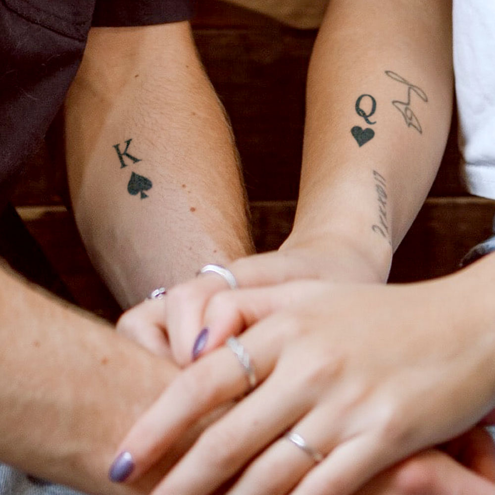 matching king and queen finger tattoos