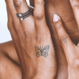 tiny butterfly semi-permanent tattoo on hand, removable halal black jagua henna tattoo