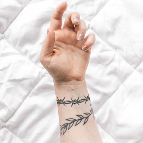 barb wire wrist tattoo